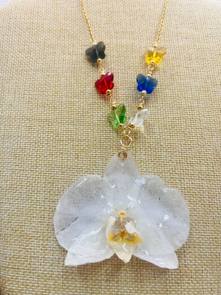 Orquídeas montadas con cristales y stainless steel 24”